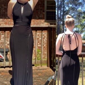 black formal maxi dress with cutout and open strappy back